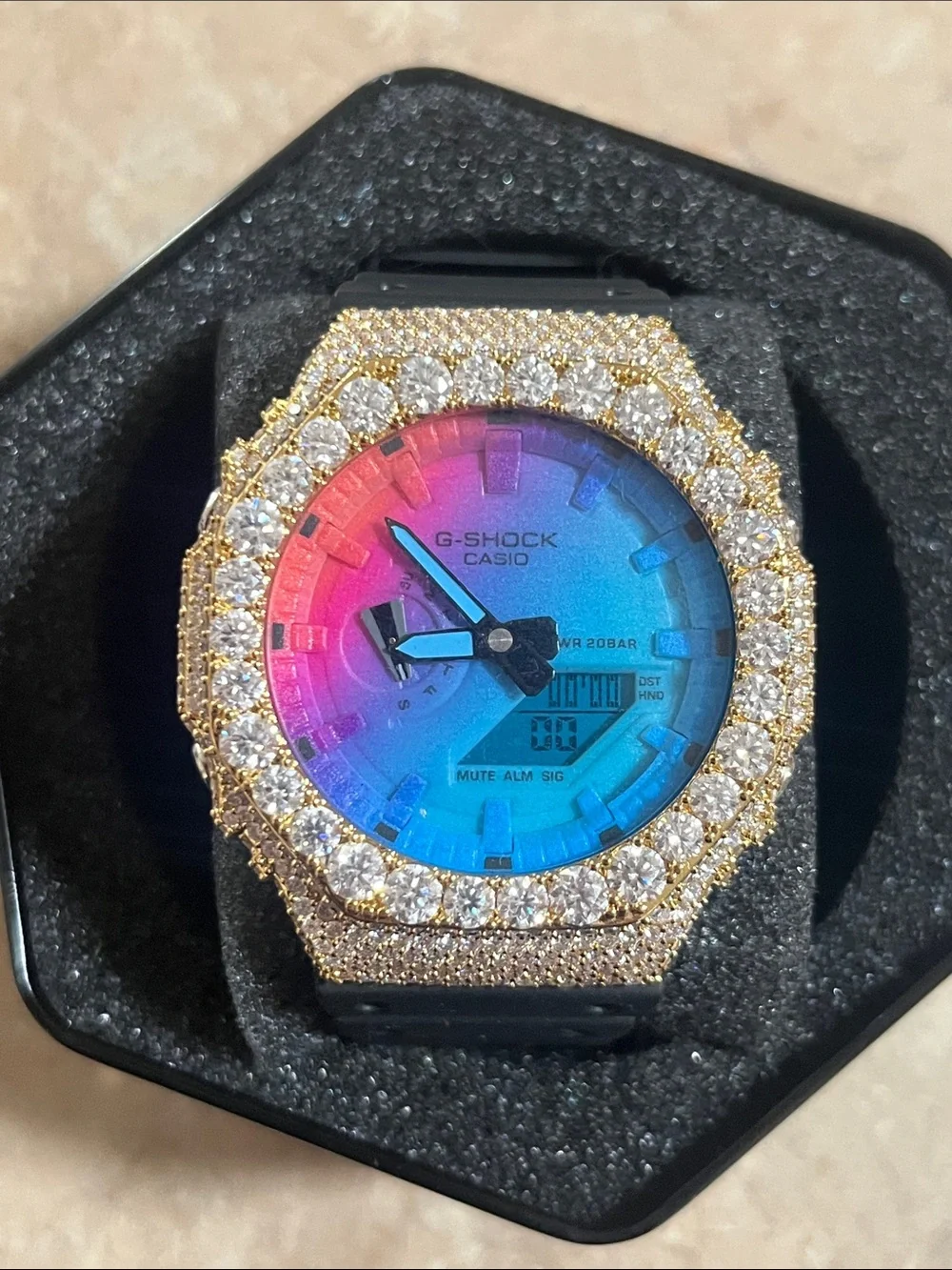 G-Shock Gold Bezel Watch with Pink-to-Blue Gradient Dial
